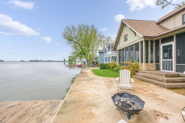 7933 Hickory Ave, Russells Point, OH 43348 - exterior space featuring an outdoor fire pit and a dock