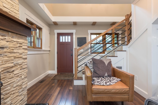 7933 Hickory Ave, Russells Point, OH 43348 - foyer with baseboards, dark wood-style flooring, and stairs