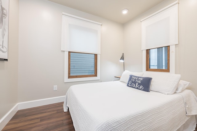 7933 Hickory Ave, Russells Point, OH 43348 - bedroom featuring dark wood finished floors, baseboards, and recessed lighting