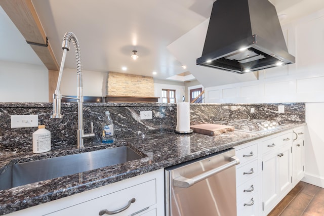 7933 Hickory Ave, Russells Point, OH 43348 - kitchen with island range hood, stainless steel dishwasher, a sink, backsplash, and dark stone countertops