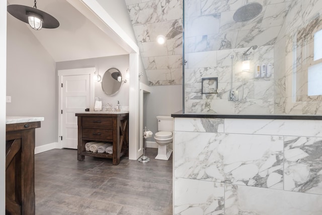7933 Hickory Ave, Russells Point, OH 43348 - full bath featuring a walk in shower, vanity, baseboards, and toilet