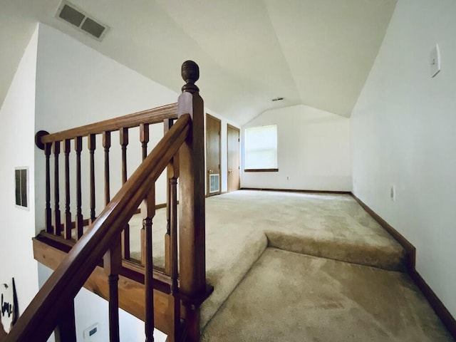 224 Oakcrest Ct, Russells Point, OH 43348 - stairway with lofted ceiling, carpet, and baseboards