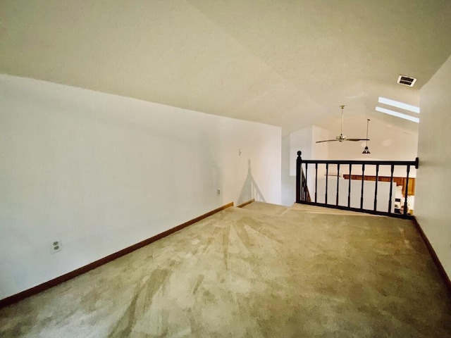 224 Oakcrest Ct, Russells Point, OH 43348 - additional living space with carpet flooring, lofted ceiling, ceiling fan, and baseboards