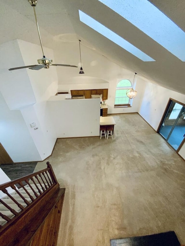 224 Oakcrest Ct, Russells Point, OH 43348 - bonus room featuring a skylight, lofted ceiling, carpet flooring, and ceiling fan