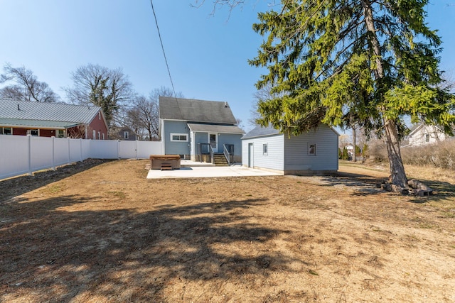 back of house with a patio and a fenced backyard