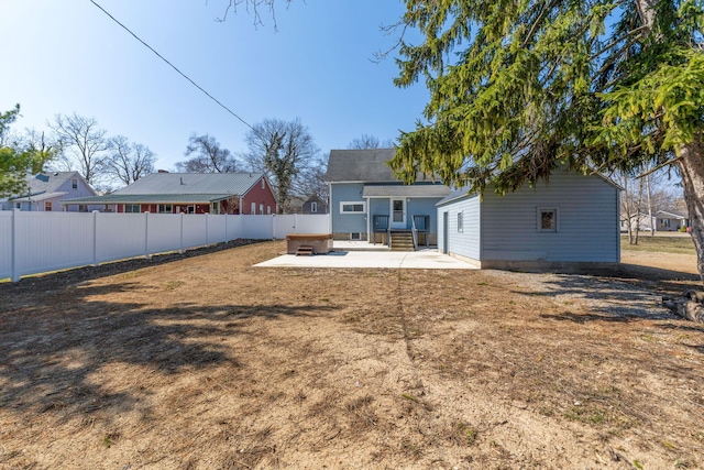 back of house with a patio area, entry steps, and a fenced backyard