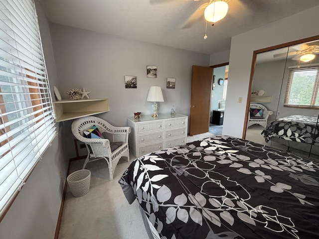 129 Chase Ave Unit 11U, Russells Point, OH 43348 - bedroom with carpet, a closet, and a ceiling fan