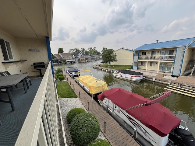129 Chase Ave Unit 11U, Russells Point, OH 43348 - dock featuring a water view, a residential view, and boat lift