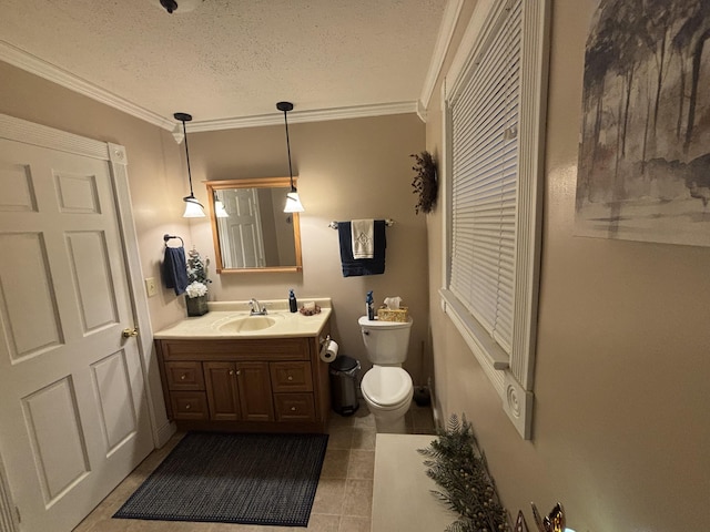 217 S 2nd St, Coldwater, OH 45828 - bathroom featuring toilet, vanity, tile patterned flooring, ornamental molding, and a textured ceiling