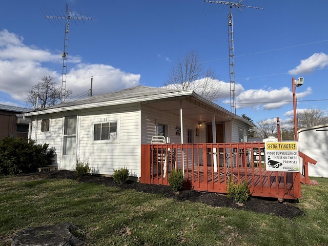 11188 Chickasaw Path, Lakeview, OH 43331 - back of house featuring a yard and a wooden deck