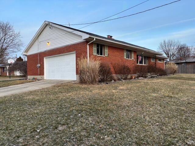 view of property exterior featuring a garage and a lawn