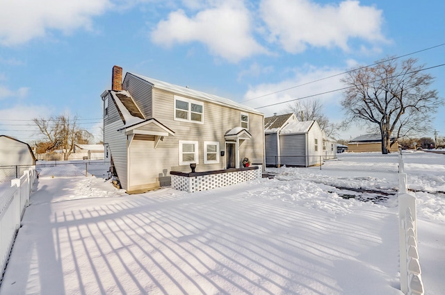 view of snow covered property