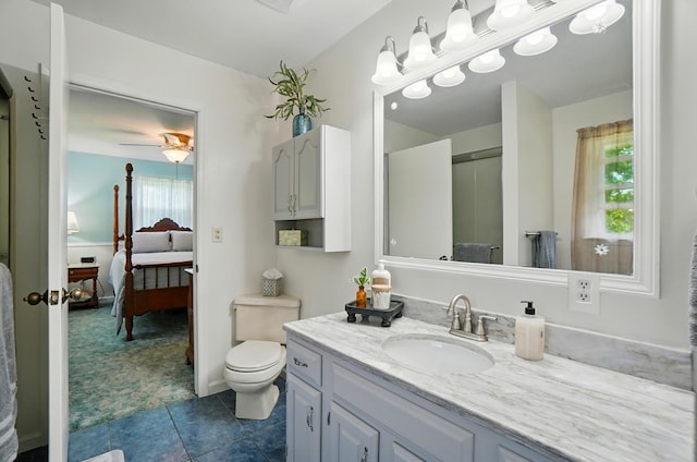 115 Deer Run Rd, Urbana, OH 43078 - ensuite bathroom featuring vanity, tile patterned floors, and a ceiling fan