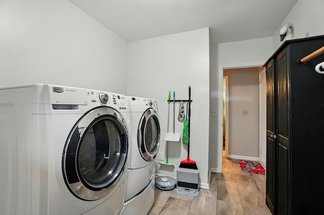 115 Deer Run Rd, Urbana, OH 43078 - laundry area with cabinet space and washing machine and dryer