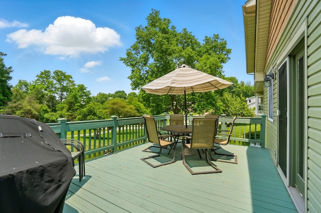 115 Deer Run Rd, Urbana, OH 43078 - wooden deck featuring outdoor dining area, a grill, and view of scattered trees