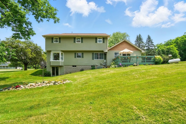 115 Deer Run Rd, Urbana, OH 43078 - rear view of house with a wooden deck and a lawn