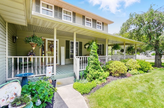 115 Deer Run Rd, Urbana, OH 43078 - entrance to property featuring a porch and a yard