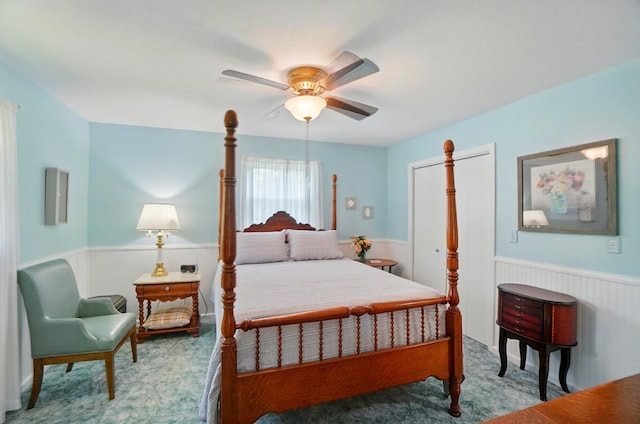 115 Deer Run Rd, Urbana, OH 43078 - bedroom with a wainscoted wall, carpet floors, and ceiling fan