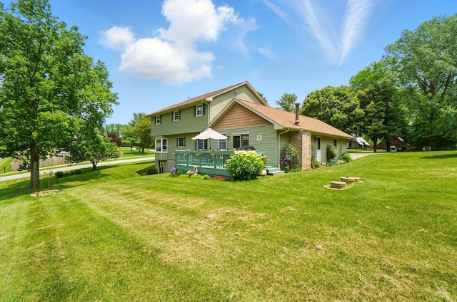 115 Deer Run Rd, Urbana, OH 43078 - back of house with a lawn and a deck