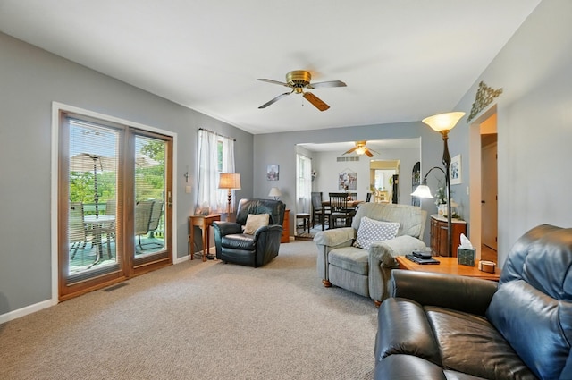 115 Deer Run Rd, Urbana, OH 43078 - living area featuring ceiling fan and carpet