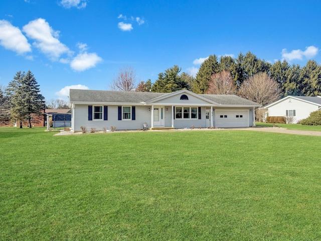 single story home with a front lawn, an attached garage, covered porch, and driveway