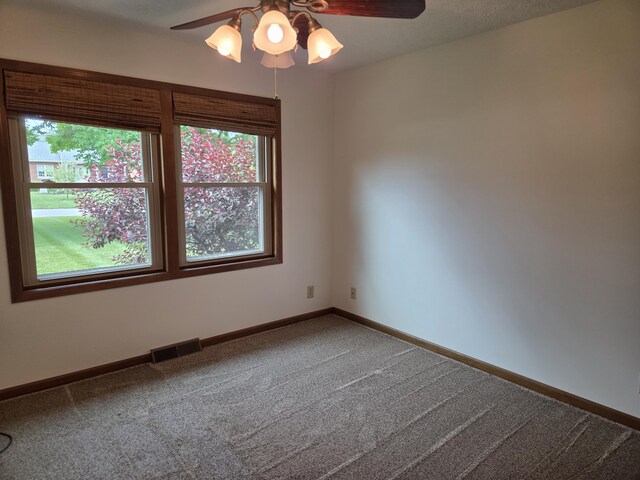 6708 Hillside Ct, Celina, OH 45822 - empty room featuring ceiling fan, plenty of natural light, carpet floors, and baseboards