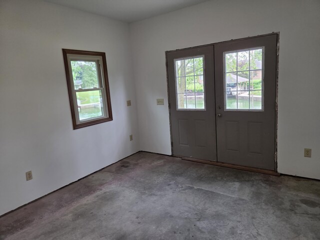 6708 Hillside Ct, Celina, OH 45822 - doorway featuring concrete flooring and french doors