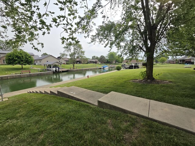 6708 Hillside Ct, Celina, OH 45822 - view of green lawn featuring a water view and a residential view