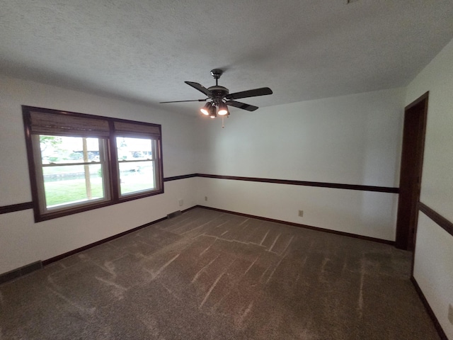 6708 Hillside Ct, Celina, OH 45822 - carpeted empty room with baseboards, a textured ceiling, and a ceiling fan