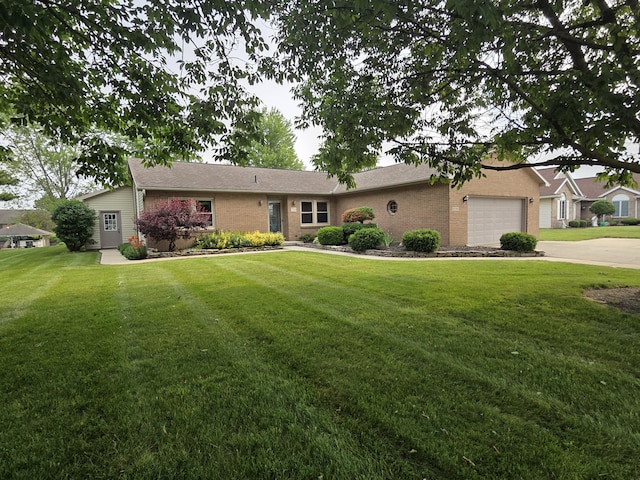 6708 Hillside Ct, Celina, OH 45822 - single story home with an attached garage, a front lawn, brick siding, and concrete driveway