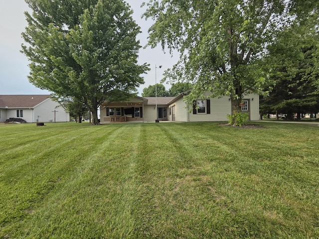 6708 Hillside Ct, Celina, OH 45822 - view of grassy yard featuring a porch