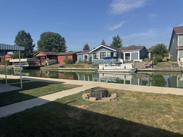 5319 Karafit Rd, Celina, OH 45822 - view of grassy yard featuring an outdoor fire pit and a water view
