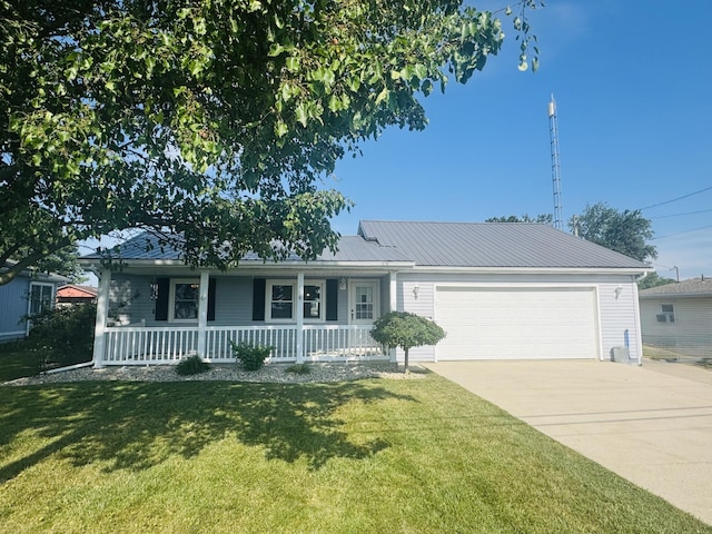 5319 Karafit Rd, Celina, OH 45822 - ranch-style home featuring a porch, a garage, a front lawn, and concrete driveway