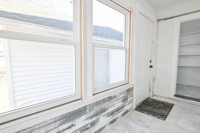 doorway with marble finish floor