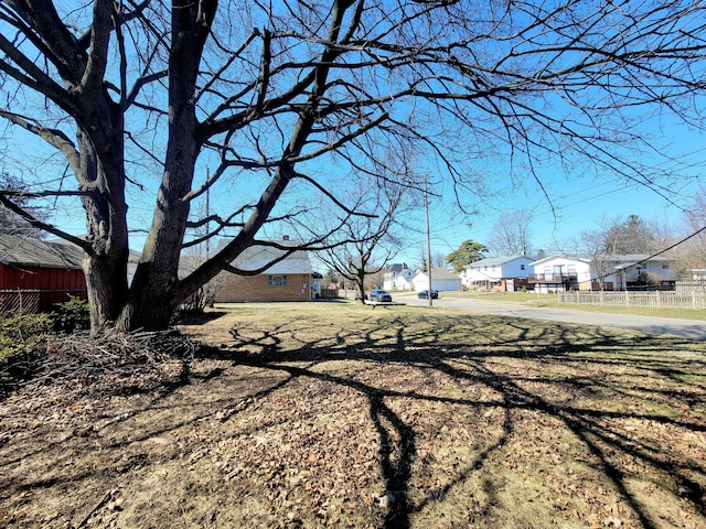 view of road with a residential view