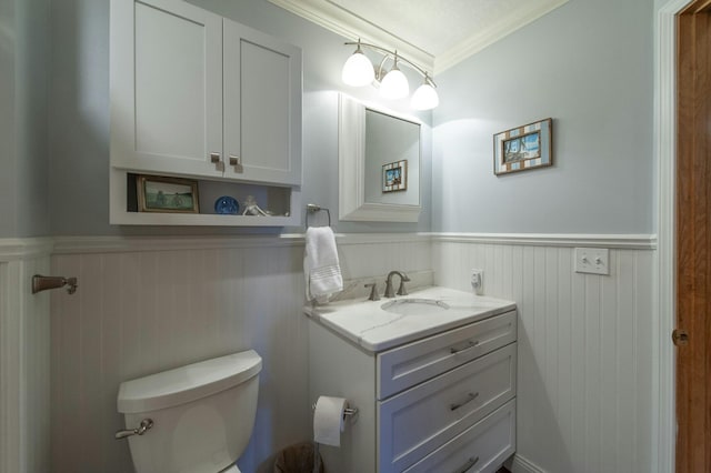 719 Woodridge Dr, Saint Marys, OH 45885 - bathroom featuring ornamental molding, vanity, and toilet