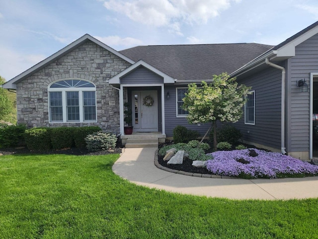 ranch-style home with a front yard