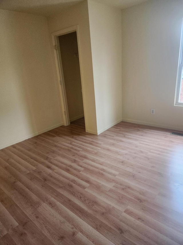 411-413 Water St, Connersville, IN 47331 - empty room with light wood finished floors and baseboards