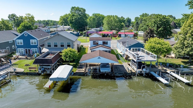 7535 Township Rd 269, Russells Point, OH 43348 - dock area with boat lift, a water view, and a residential view