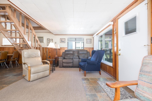 7535 Township Rd 269, Russells Point, OH 43348 - living area with wood walls, wainscoting, and stairway