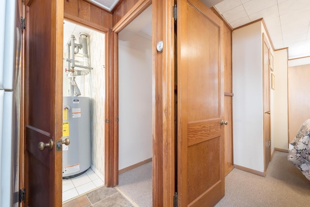 7535 Township Rd 269, Russells Point, OH 43348 - corridor featuring water heater, light carpet, and ornamental molding