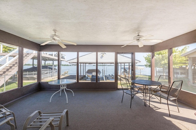 7535 Township Rd 269, Russells Point, OH 43348 - sunroom with ceiling fan and a water view