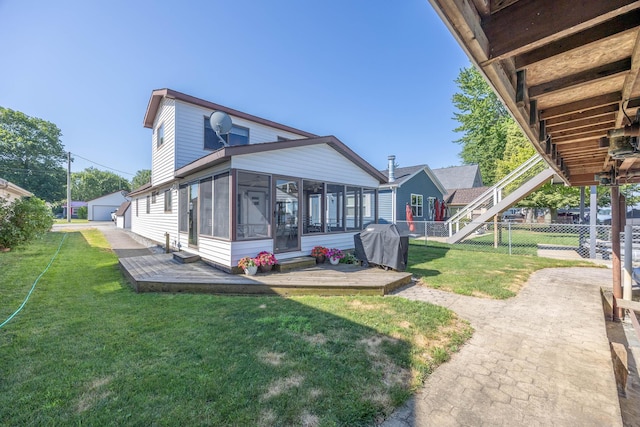 7535 Township Rd 269, Russells Point, OH 43348 - back of house with a sunroom and a detached garage