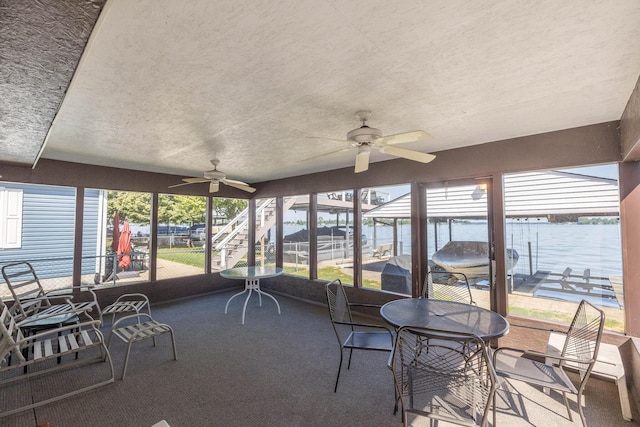 7535 Township Rd 269, Russells Point, OH 43348 - sunroom with a ceiling fan and a water view