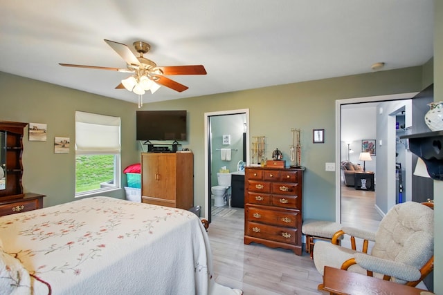 1264 Pheasant Run Unit 74, Springfield, OH 45503 - bedroom featuring light wood-type flooring, a ceiling fan, and ensuite bathroom