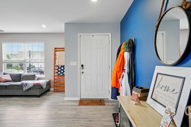1087 Ayrshire Dr, Columbus, OH 43207 - entrance foyer featuring wood finished floors, recessed lighting, and baseboards