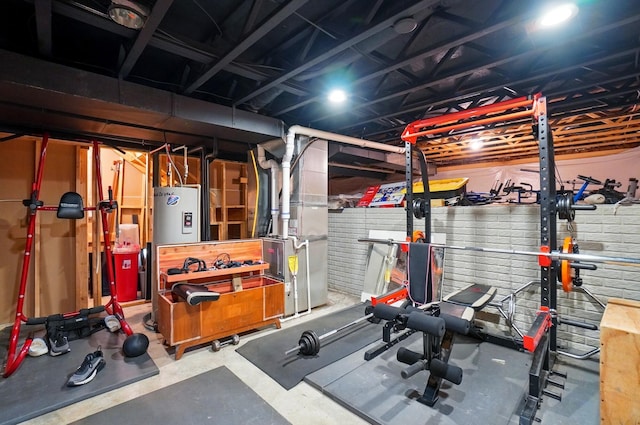 1087 Ayrshire Dr, Columbus, OH 43207 - workout room with heating unit and electric water heater