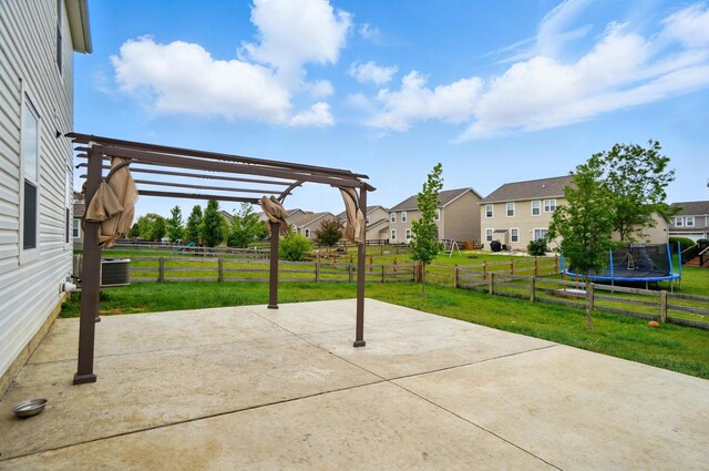 1087 Ayrshire Dr, Columbus, OH 43207 - view of patio / terrace with a trampoline, a pergola, and a residential view