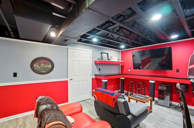 1087 Ayrshire Dr, Columbus, OH 43207 - home theater room with wood finished floors and baseboards