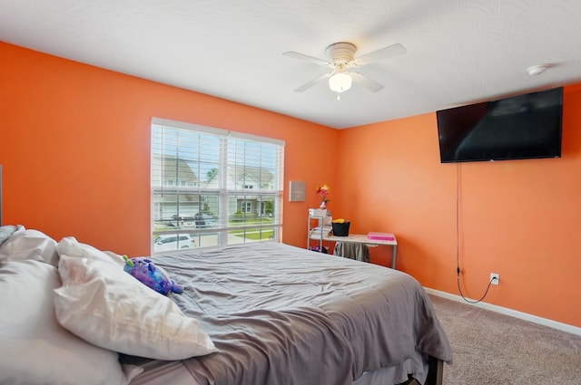 1087 Ayrshire Dr, Columbus, OH 43207 - carpeted bedroom featuring baseboards and a ceiling fan